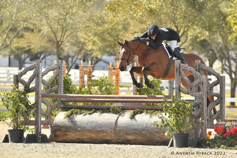 Jennifer Alfano Banks Winning Check in $30,000 USHJA International Hunter Derby at Pin Oak Charity Horse Show